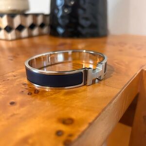 Hermes Clic HH bracelet in matte navy with silver hardware.
